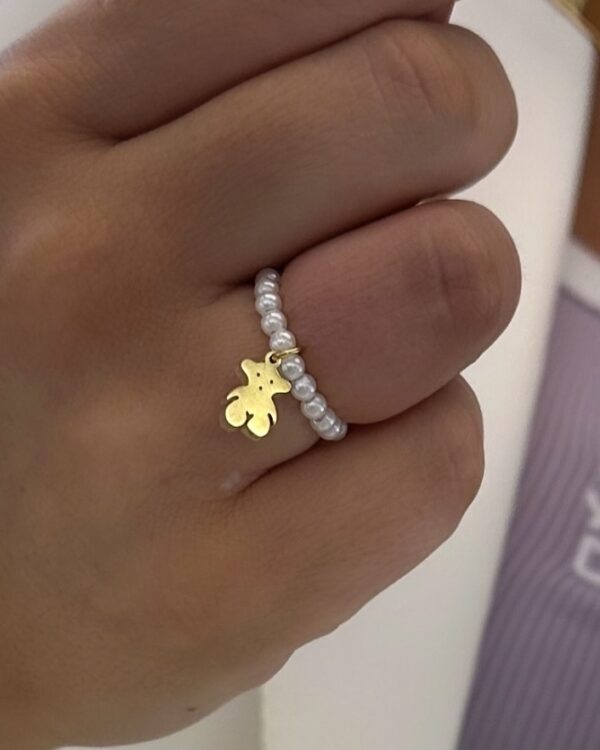 Anel pérolas e urso