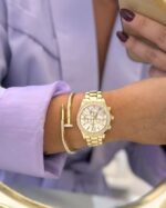 Relógio redondo dourado